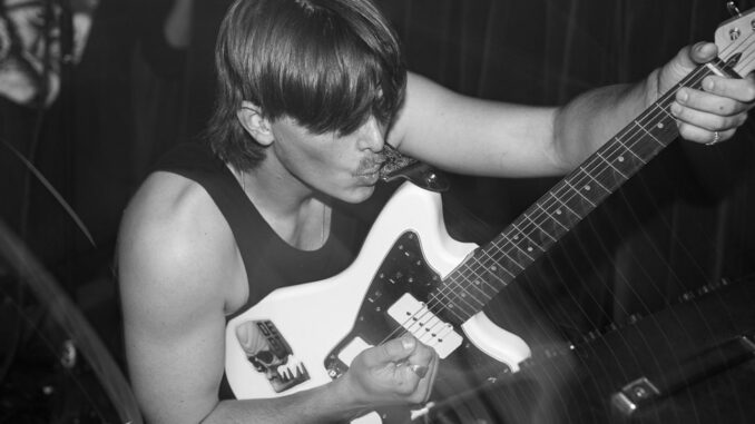 IMG_2414 Man playing electric guitar