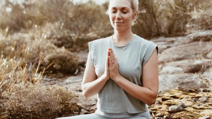 Image of Melissa Kitchen in yoga pose