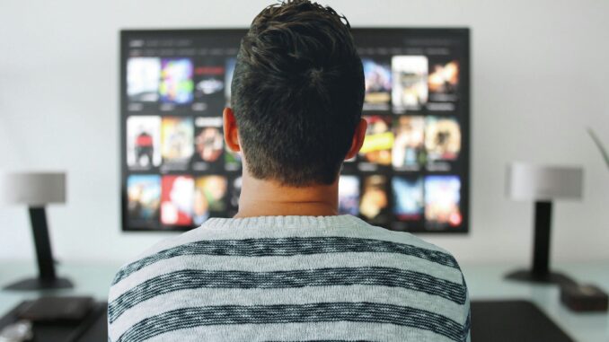 tv-man-watching-room-office-modern-1454963-pxhere.com Man watching TV in living room