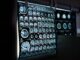 A black screen with blue several MRI pictures of brains